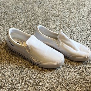 White Nike slip on tennis shoes
